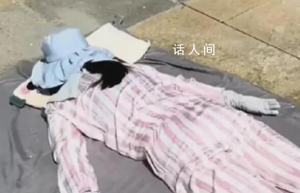女子高溫全副武裝趴水泥地上曬背 引發了人們的廣泛猜測和爭議