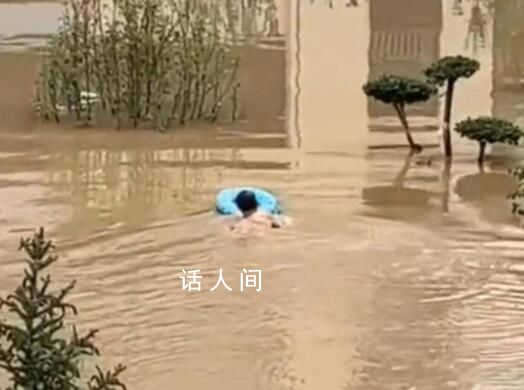 男子10次潛入洪水為救援隊開小區(qū)大門 這位好漢還是退伍軍人