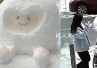 車主在車上堆雪人 女子拍照后踢壞