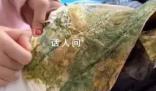 千元羽絨服被姥姥家火炕烙糊 心疼地對姥姥說：下回少燒點吧