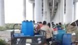 廣州三民島村民在臨時供水點取水 供電和通訊網絡正常