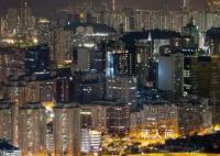 內(nèi)地買房客炒爆香港樓市 有大買家一次買十套